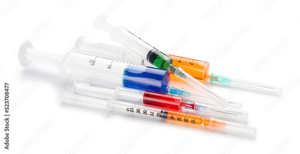 Different medical syringes with vaccine on white background Different medical syringes with vaccine on white background