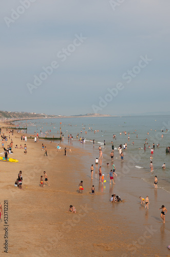 playing on sand and swimming in the sea - Bournemouth Beach (ID: 523712221)