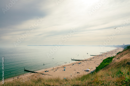beach and sea - swimmers and sunbathers on Bournemouth Beach (ID: 523713692)