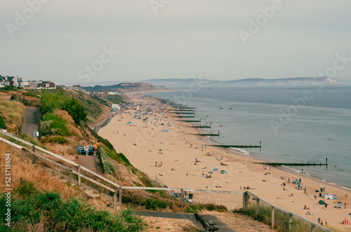 beach and sea - swimmers and sunbathers on Bournemouth Beach (ID: 523713694)