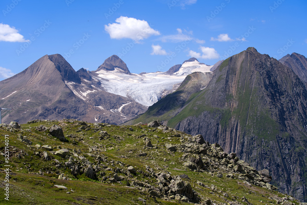 Swiss Alps with Rhone Glacier seen from Swiss mountain pass Nufenen on a sunny summer day. Photo taken July 3rd, 2022, Nufenen Pass, Switzerland.