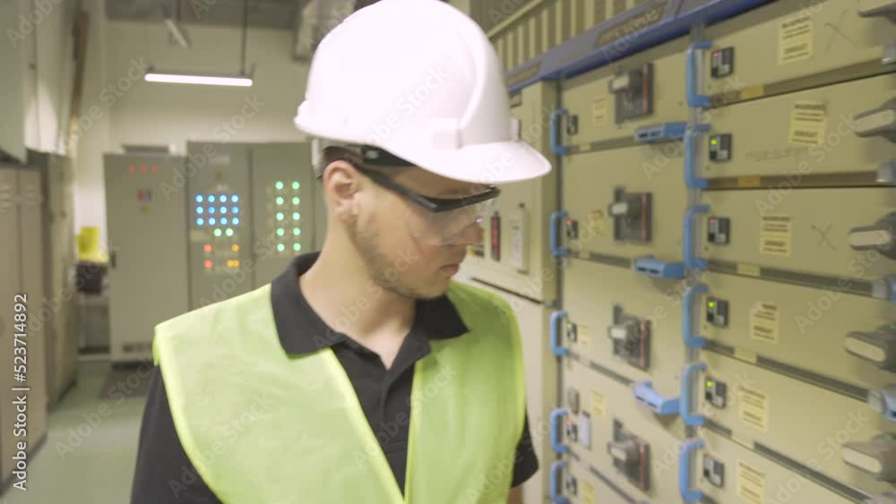 Coal power plant central control panels.
The engineer checks the panels and continues his work.
Coal power plant central control panels.
The engineer checks the panels and continues his work.