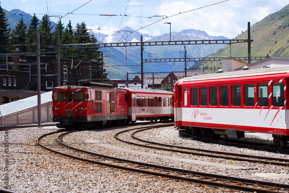 trains-of-matterhorn-gotthard-railway-at-train-station-of-mountain
