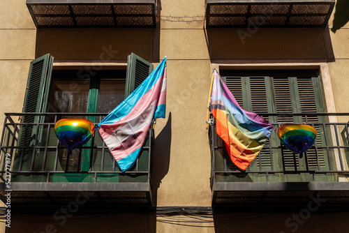 Balconies of the Chueca neighborhood of Madrid adorned with colors of the lgtb rainbow flag