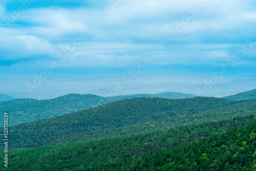 aerial view of wild wooded hills on a cloudy day