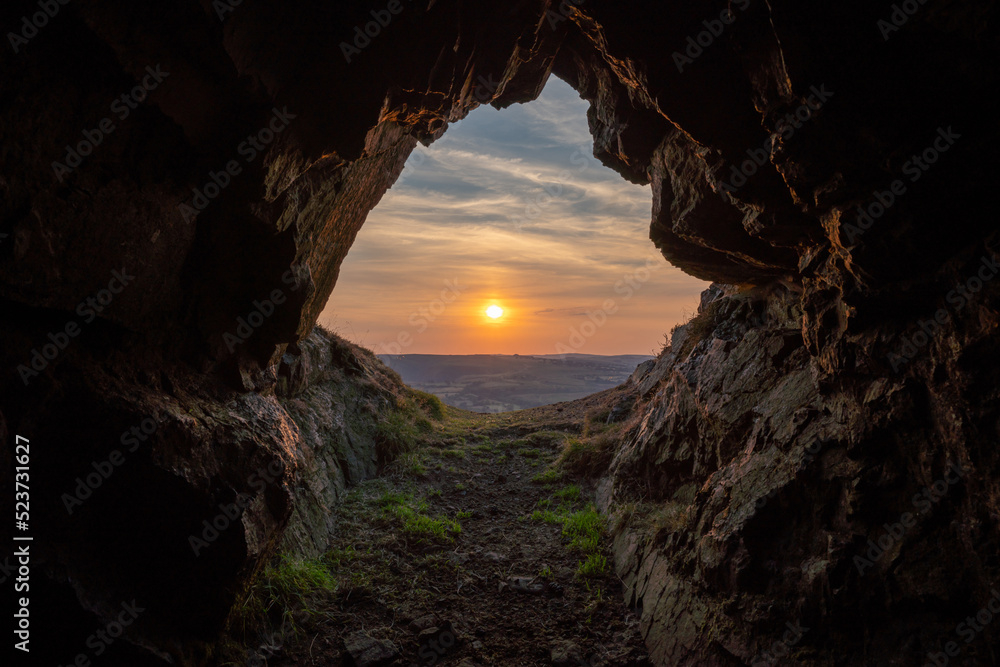 Sunset on the last hiding place of king Caractacus, a cave on the hill fort of Caer Caradoc in Shropshire, England