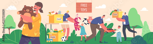 Young Volunteers Giving Toys to Orphan Kids around Donation Box with Goods for Children. Help to Poor Kids, Charity