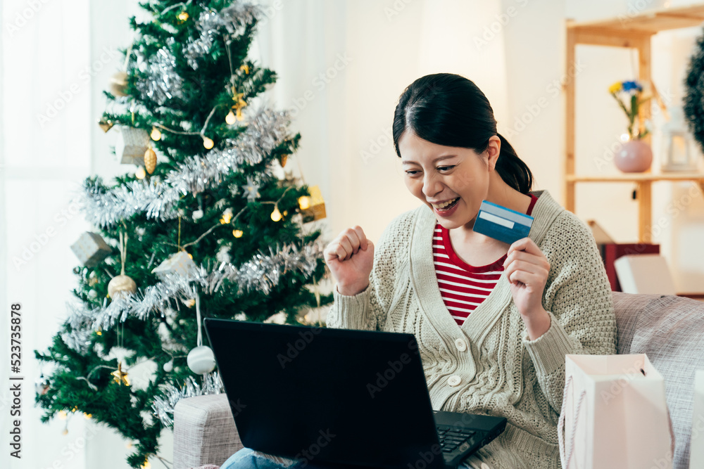 asian lady finding a discount luxury goods on the online marketplace