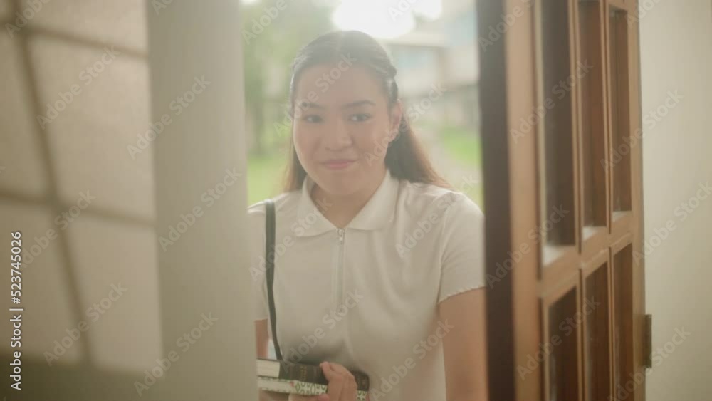 Lovely Female Opens The Door And Entering Inside The House. Slow Motion Lovely Female Opens The Door And Entering Inside The House. Slow Motion