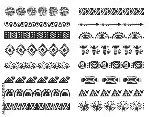 African tribal brushes. Black and white hand drawn horizontal seamless borders isolated Vector set. Ancient culture dividers with sun, arrow and geometric shape elements for ornamental frames