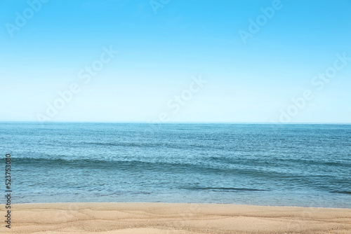 Picturesque view of sandy beach near sea