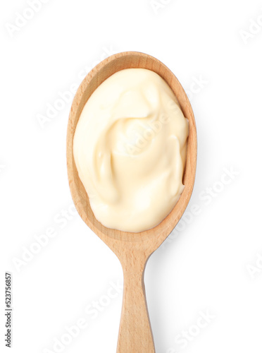Mayonnaise in wooden spoon isolated on white, top view