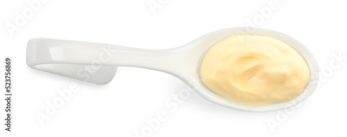 Mayonnaise in ceramic serving spoon isolated on white, top view