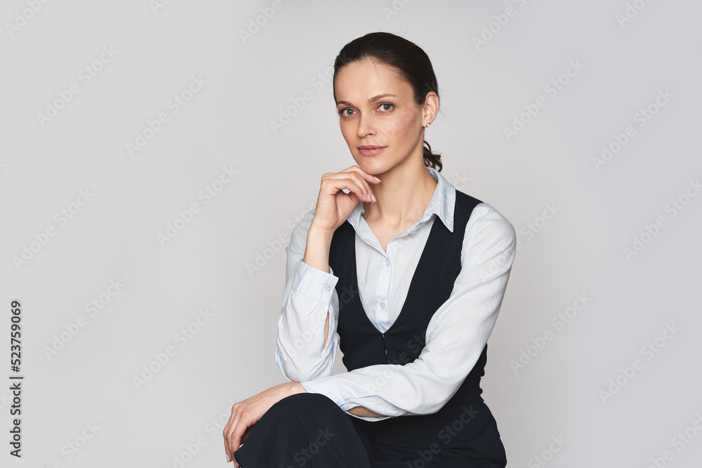 Young happy woman in office clothes isolated on white Young happy woman in office clothes isolated on white