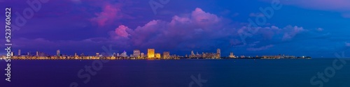 A view of Mumbai's Marine Drive closer to night with a few purple clouds. Overlooking the Back Bay, this area marks the southernmost part of the island city of Mumbai jutting out into the Arabian Sea.