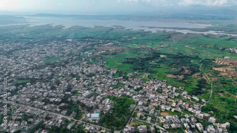 Aerial View of Mirpur Azad Kashmir city with clouds, Drone photography of Pakistan or India or South Asia
