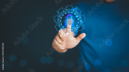 Man login with fingerprint scanning technology. Security concepts and fingerprint password control in the technology of the future.