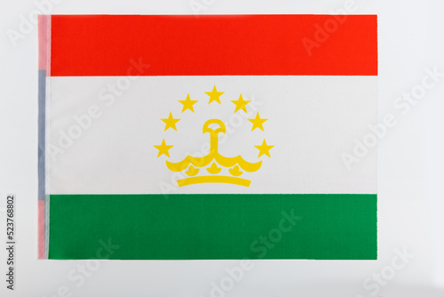 Tajikistan flag on white background photo