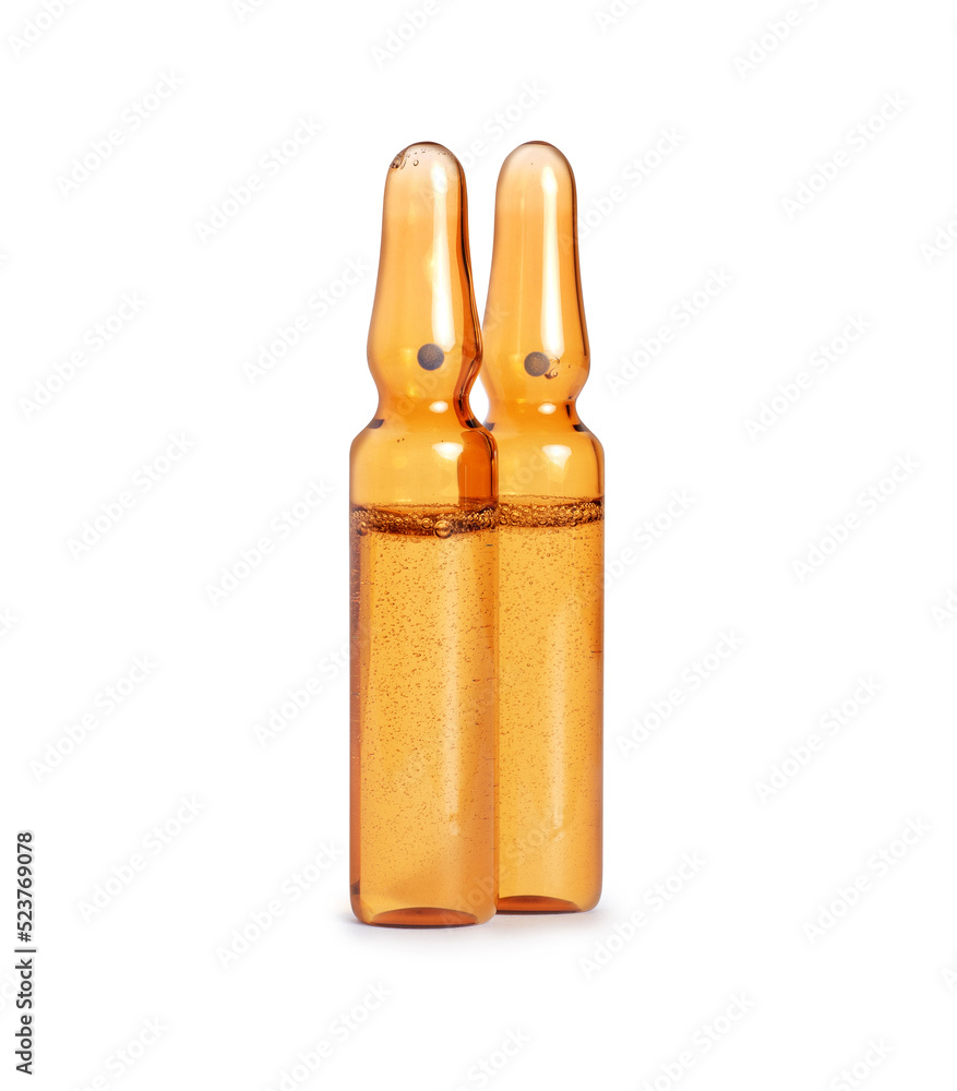 Two medical or cosmetic ampoules with bubbles on a white background Two medical or cosmetic ampoules with bubbles on a white background