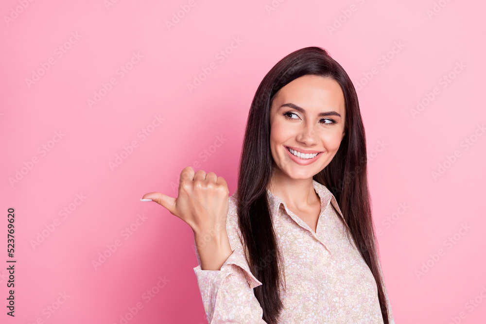 Photo of young gorgeous pretty cute nice woman finger directing empty space look new ad isolated on pink color background Photo of young gorgeous pretty cute nice woman finger directing empty space look new ad isolated on pink color background