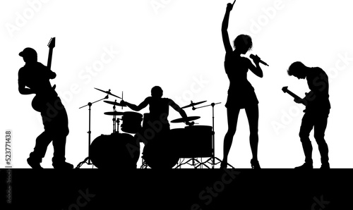 Fotografia A musical group or rock band playing a concert in silhouette