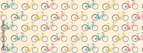 Seamless pattern of bikes. Bikes in different colors. Seamless pattern swatch. Yellow, green and pink bikes. Pattern of classical bikes.
