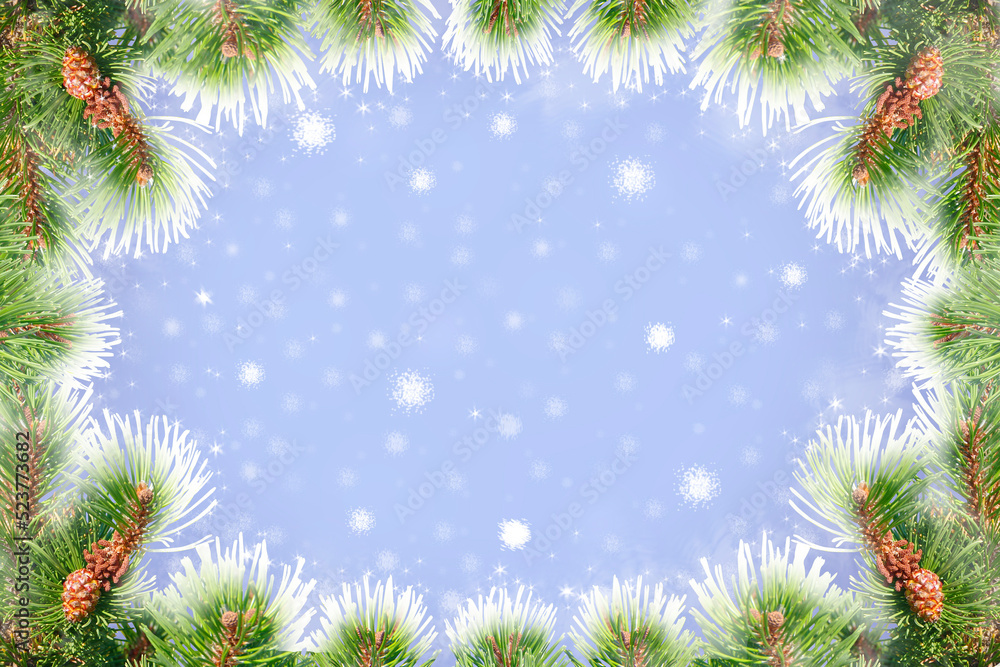 Frame of snow-covered spruce branches on a blue background. Winter theme. Frame of snow-covered spruce branches on a blue background. Winter theme.