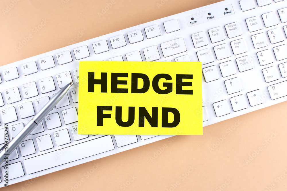 Text HEDGE FUND text on a sticky on keyboard, business concept Text HEDGE FUND text on a sticky on keyboard, business concept