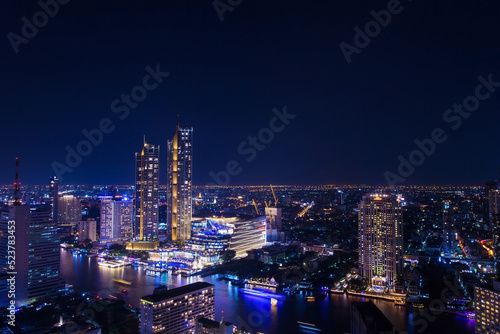 City center buildings along the Chao Phraya River, Bangkok at night, Along the river have many hotel and hight building for business. Bangkok is centre for investment. one of colourful cities in Asia.