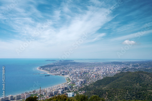 Attractive spring cityscape of Vlore city from Kanines fortress. Captivating morning sescape of Adriatic sea. Spectacular outdoor scene of Albania, Europe. Traveling concept background.