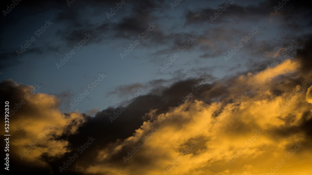 Dramatic sky with clouds at sunset