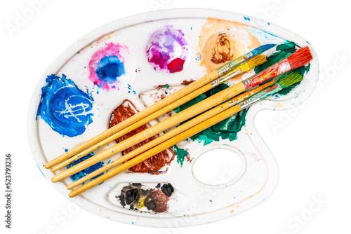 Fotografija Paintbrush set on the art palette with stains of watercolor paint