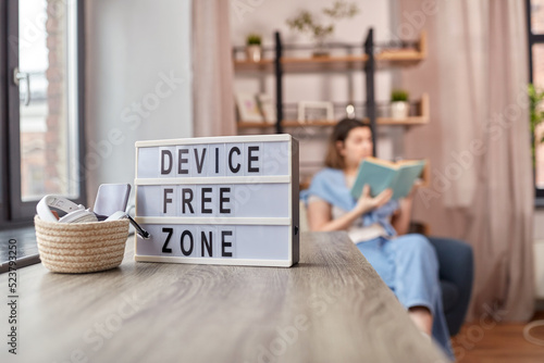 Fotomural digital detox and leisure concept - close up of device free zone words on light
