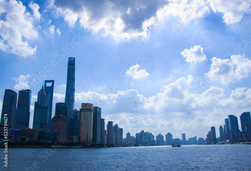 city metroplis  shanghai  pudong  lujiazui  landmark buildings architecture  river  Huangpu river  cloud  sky  skyline