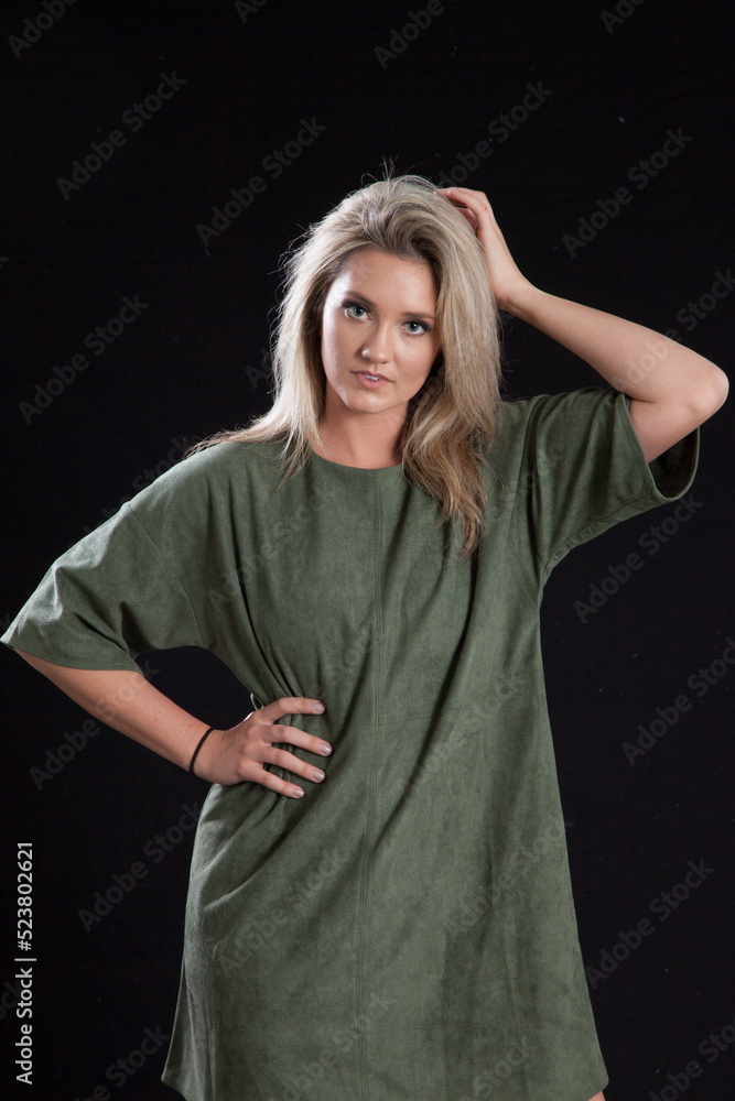 Thoughtful Blond with her hand on her hip Thoughtful Blond with her hand on her hip