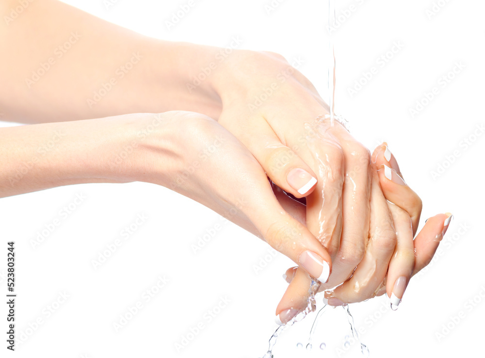 Fototapeta premium Young woman washing hands isolated on white background
