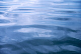 Sea surface. Blue water texture. Close up blue water surface at deep ocean
