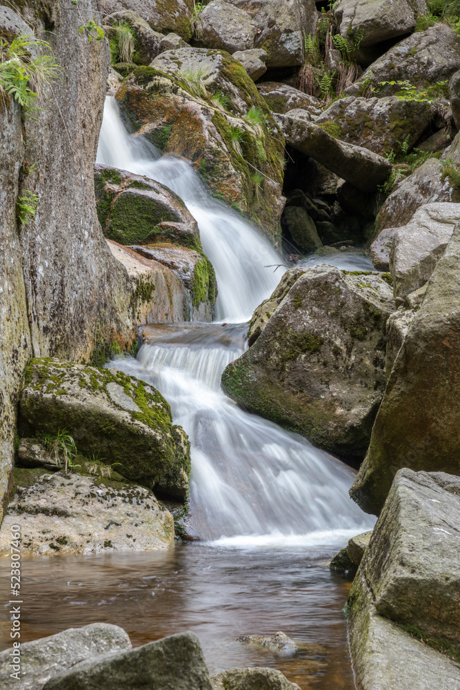 cascade on a mountain stream - water in motion - long exposure cascade on a mountain stream - water in motion - long exposure