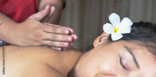 Close up hands doing Thai massage theraphy in spa beauty shop, Spa and Massage concept
