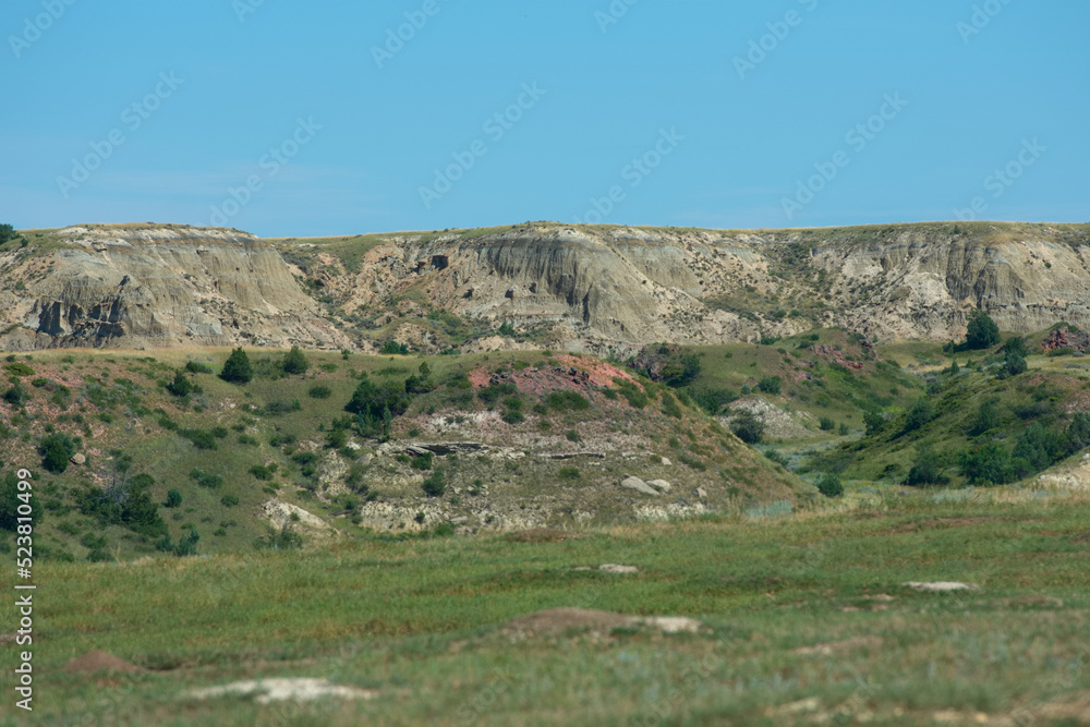 Multi colored and layered rock hills at Theodore Roosevelt National Park