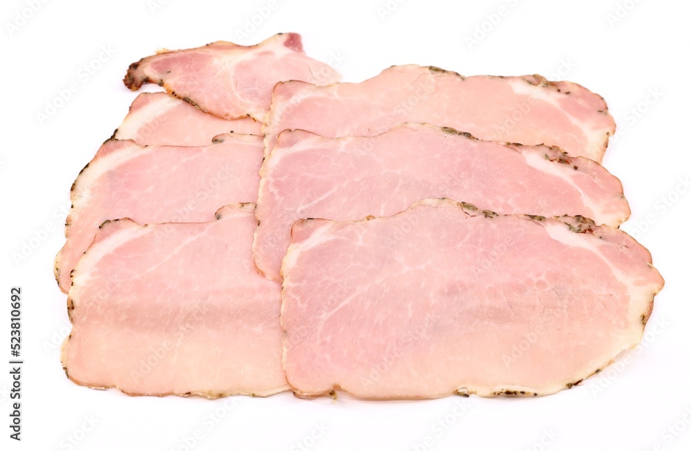Slices of Arista on white background. It is a traditional  roast pork loin of the Tuscany cuisine, rubbed with a  mix of herbs, salt and pepper.