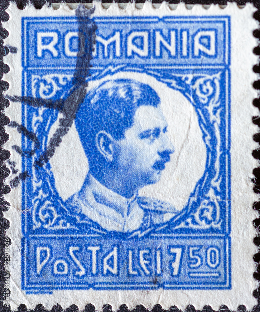 Naklejka premium ROMANIA - CIRCA 1932: a postage stamp from Romania , showing a portrait of Carol II of Romania (1893-1953). Circa 1932
