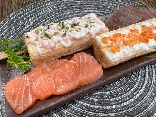 Salmon and tuna with mentaiko and ekura sweet egg  photo