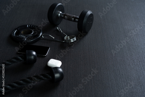 Fitness equipment on dark background, fitness equipment