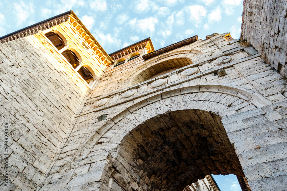 Fototapeta premium The Etruscan Arch or Arch of Augustus or Augustus Gate (with Augusta Perusia written on the facade) is a gate in the Etruscan wall of Perusia, known today as Perugia in Umbria, Italy, Europe.