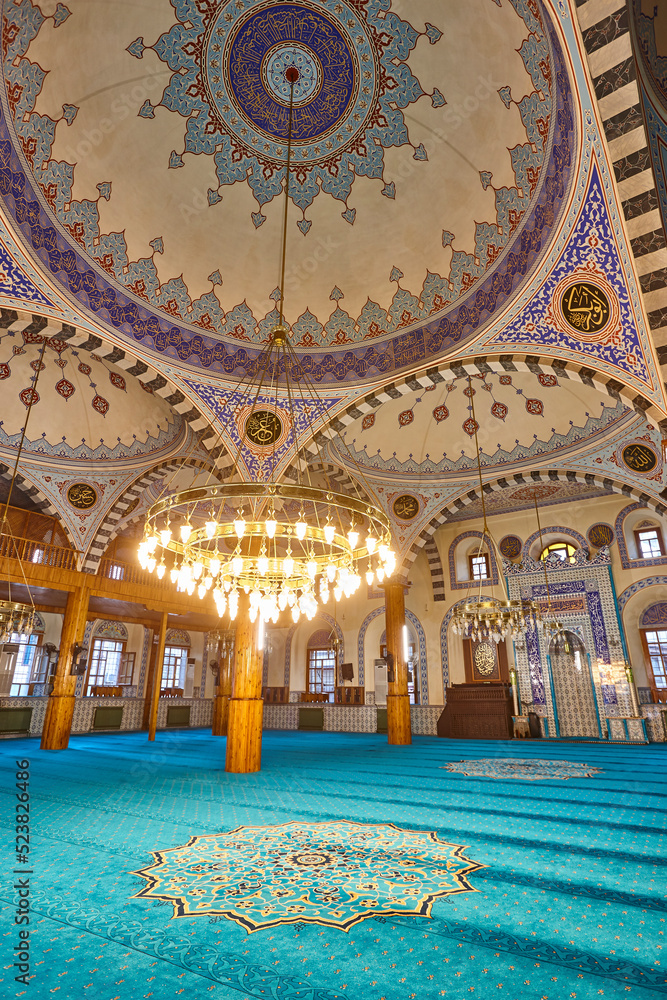 Ancient Kapi mosque illuminated interior in Konya. Anatolia, Turkey