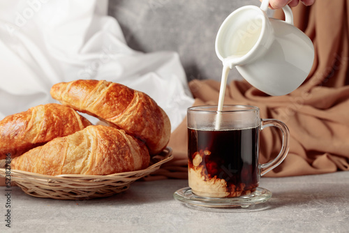Photos Croissants and coffee with cream.
