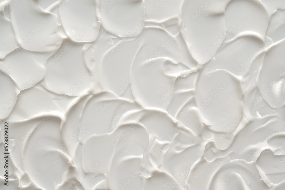 Creamy foundation texture isolated. Smear of face cream isolated. Texture of cream background Creamy foundation texture isolated. Smear of face cream isolated. Texture of cream background