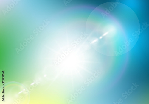 Abstract defocused summer background with white lens flare. Blue green color blurred backdrop. Spring vacation impression wallpaper