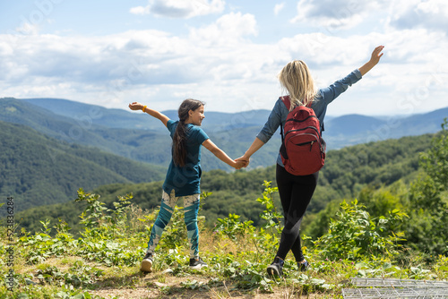 Mother and Daughter enjoying the view after a mountain hike